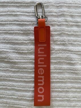 lululemon athletica Burnt Apricot/Tera Orange Never Lost  Keychain